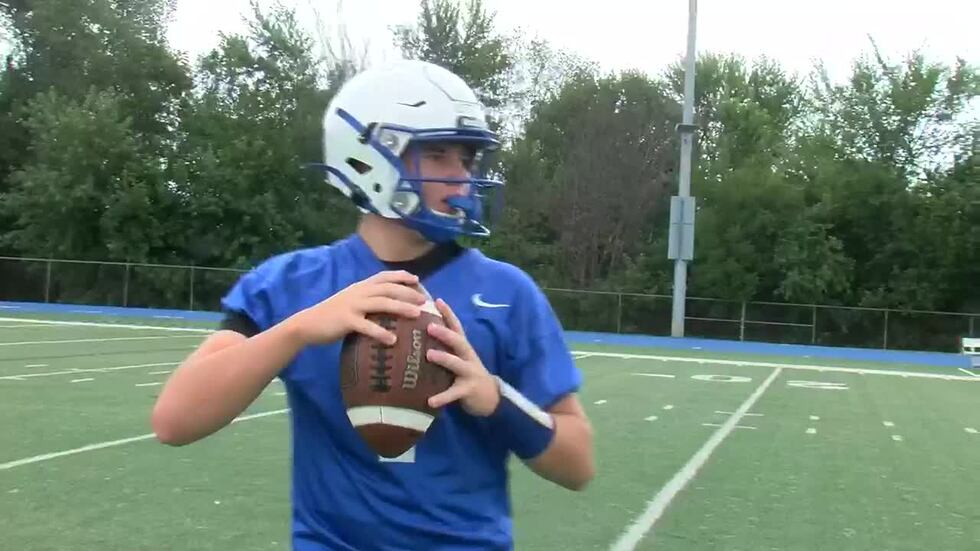 QB Bradyn Little preps for Homecoming game.