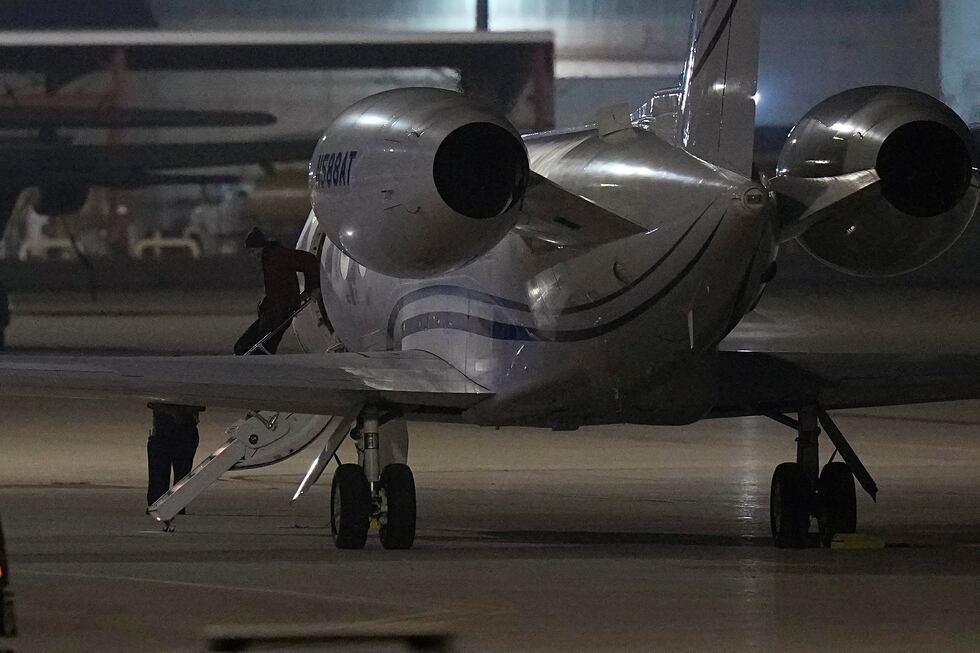 WNBA star Brittney Griner deplanes at Kelly Field in San Antonio, Texas, following her release...